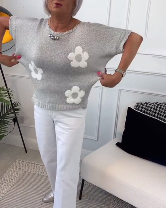 Wąski sweterek w kwiaty z okrągłym dekoltem