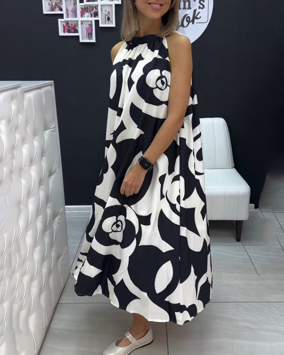 Elegancka sukienka bez rękawów z nadrukiem