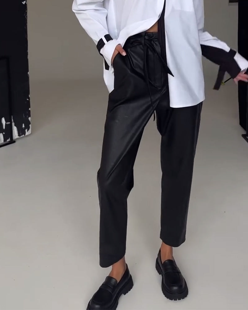 Spodnie z imitacji skóry o kroju slim fit