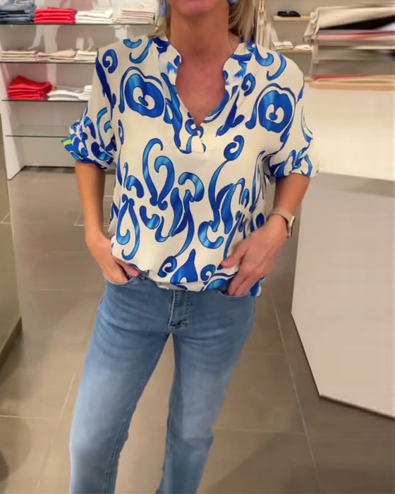 Elegancka bluzka z długim rękawem i dekoltem w kształcie litery V