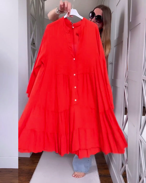 Sukienka w jednolitym kolorze z dekoltem w kształcie litery V rozkloszowana i z długimi rękawami