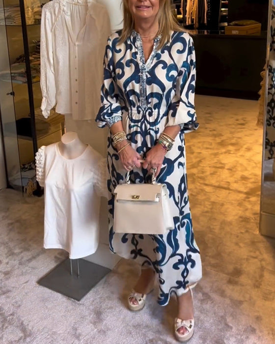 Luźna sukienka z nadrukiem i dekoltem w szpic