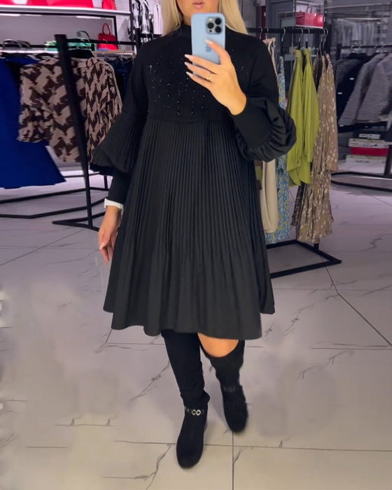 Sukienka z bufiastymi rękawami i stójką