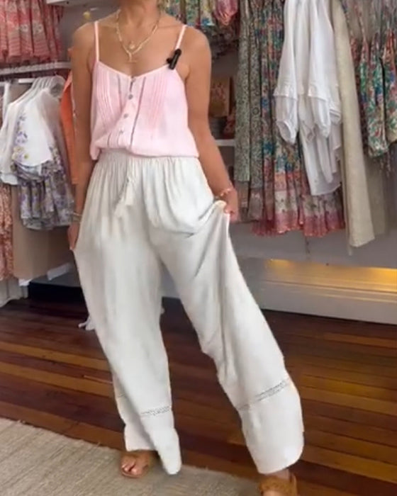 Jednokolorowe wygodne spodnie z szerokimi nogawkami i kieszeniami