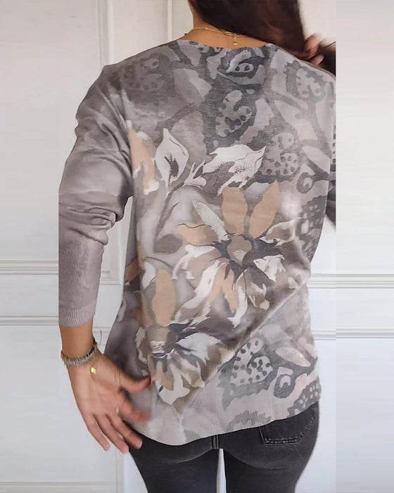 Bluzka z długim rękawem i dekoltem w kształcie litery V w kwiatowy wzór