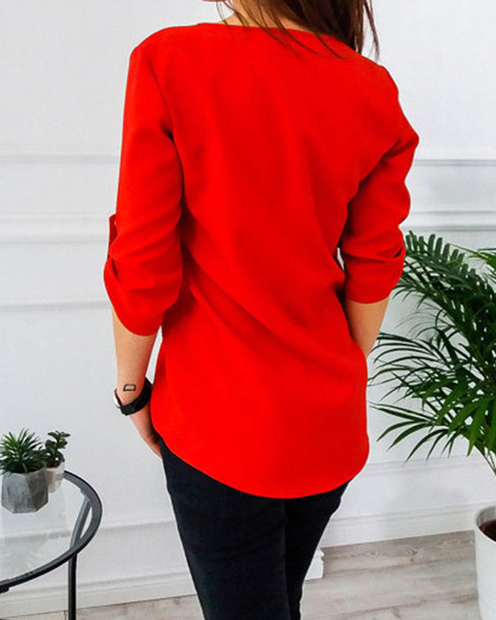 Solidna bluzka zapinana na zamek