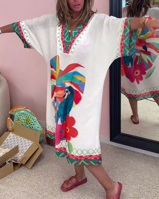 Sukienka z nadrukiem graffiti z dekoltem w szpic