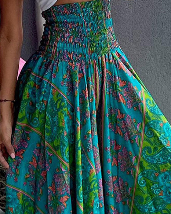 Eleganckie spodnie z szeroką nogawką i nadrukiem w stylu vintage