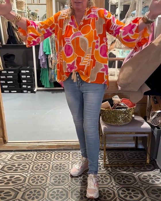 Bluzka kolorowa z szerokim ramieniem