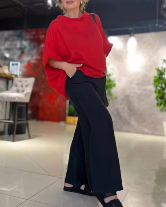 Luźna bluzka z okrągłym dekoltem w jednolitym kolorze