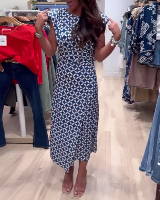 Elegancka sukienka bez rękawów z geometrycznym nadrukiem i okrągłym dekoltem