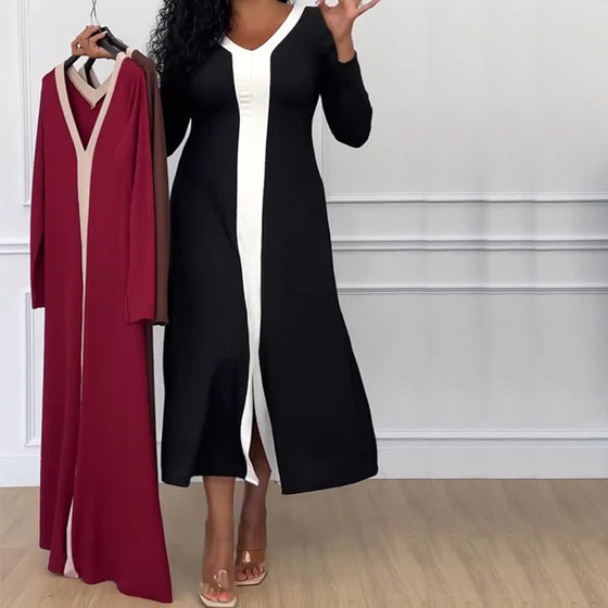 Kontrastowa sukienka z dekoltem w serek i eleganckim rozcięciem