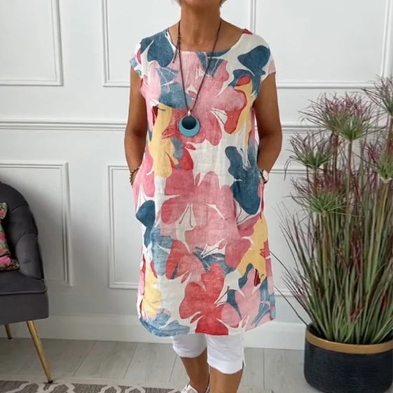 Długa bluzka w kolorowe kwiatowe wzory