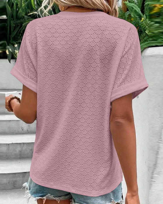 Swobodna bluzka z dekoltem w serek w jednolitym kolorze zapinana na guzik