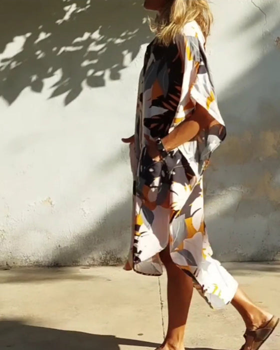 Sukienka z kieszeniami i nadrukiem liści