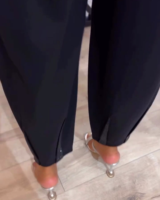 Spodnie w jednolitym kolorze ze ściągaczem i cekinami