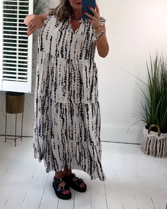 Sukienka z dekoltem w serek i nadrukiem