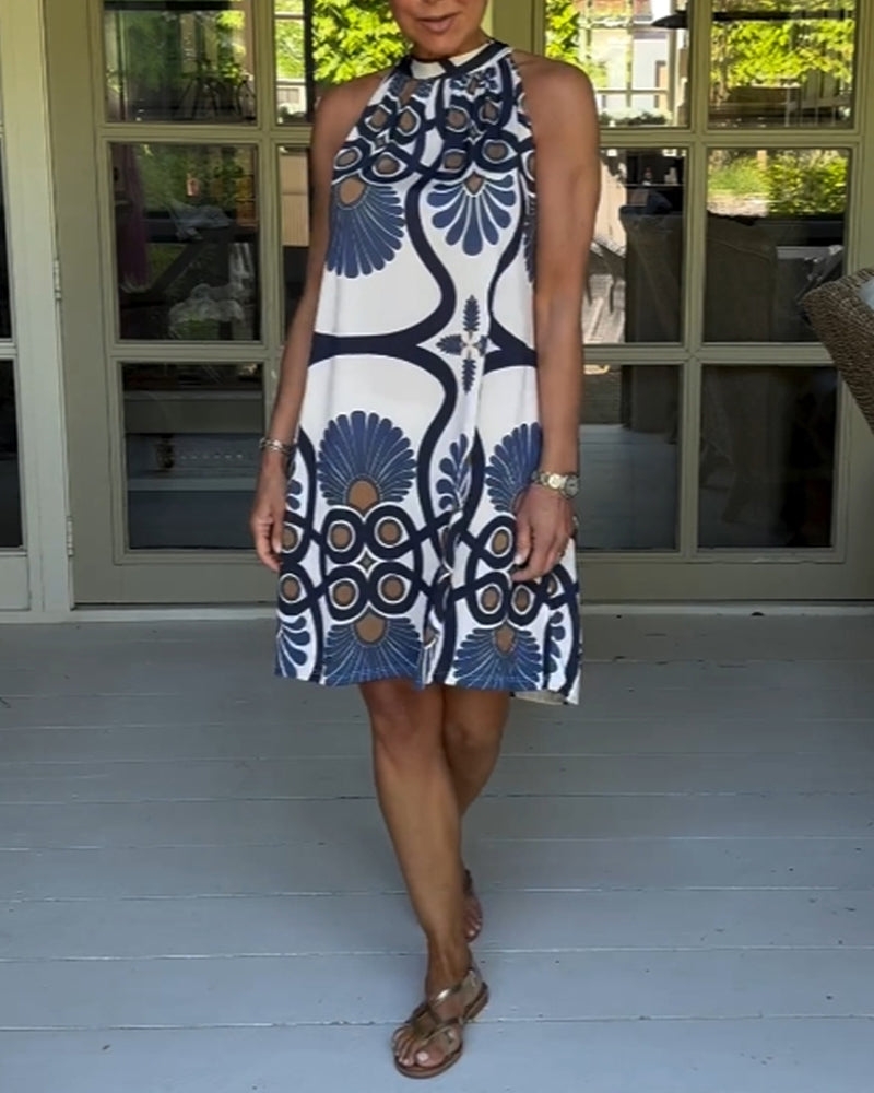 Sukienka z dekoltem i nadrukiem w stylu vintage