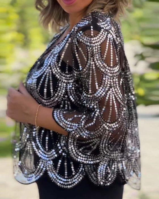 Elegancka marynarka z cekinami i falowanymi brzegami