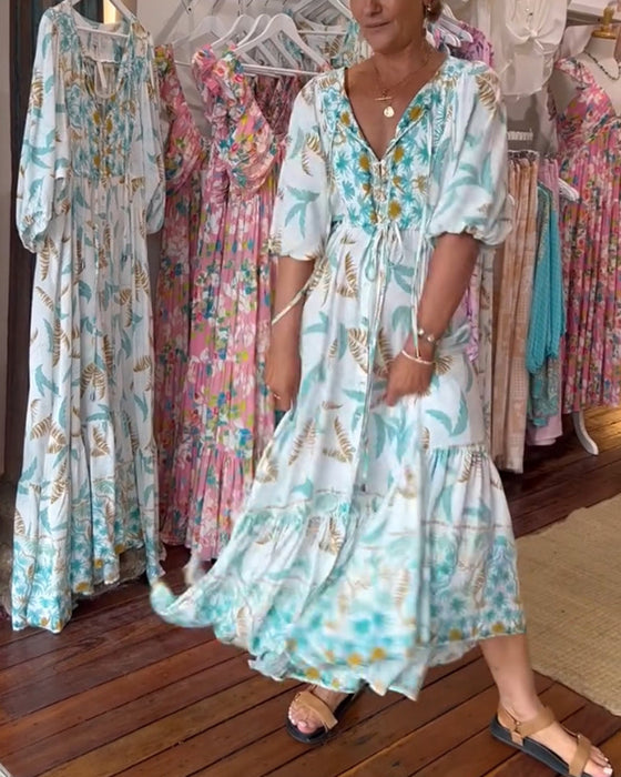 Damska sukienka maxi z dekoltem w kształcie litery V i nadrukiem w liście