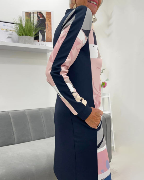 Sukienka z długim rękawem i kieszenią zapinana na suwak w bloki kolorów