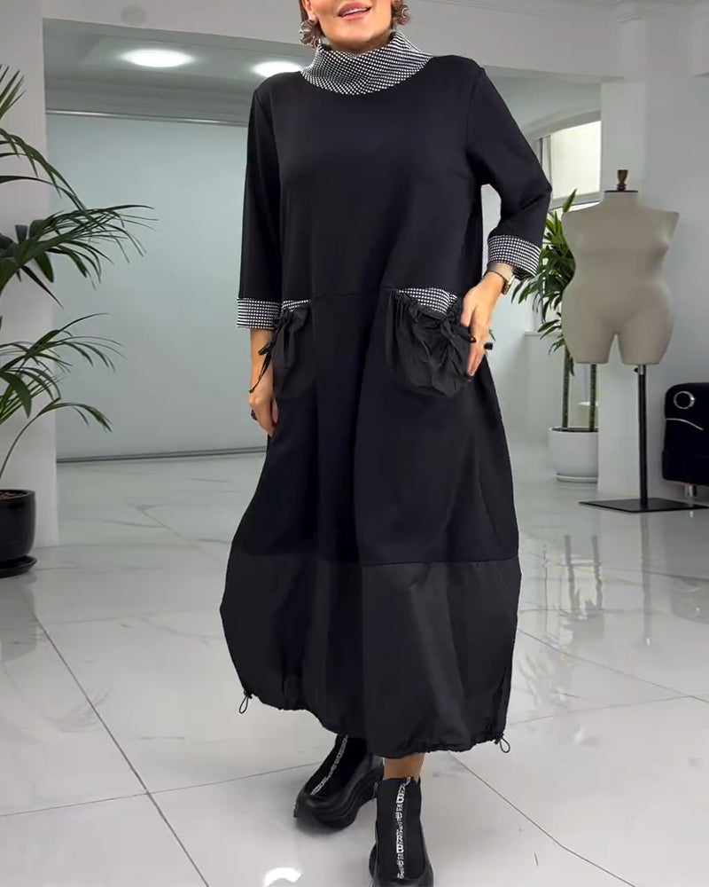 Sukienka w kratę z wysokim kołnierzem i kieszeniami