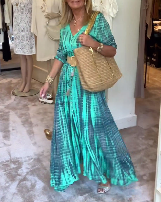 Zapinana na guziki sukienka maxi z nadrukiem i dekoltem w kształcie litery V