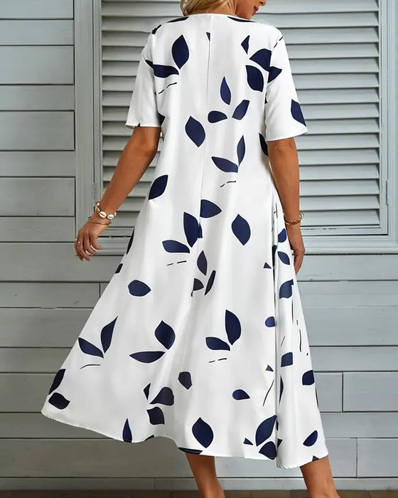 Sukienka z krótkim rękawem i kwiatowym dekoltem V