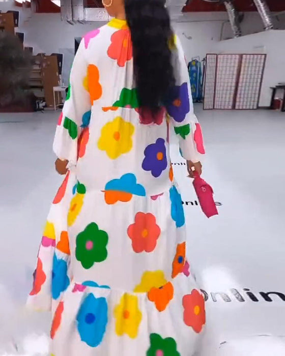 Sukienka na co dzień z kolorowym kwiatowym nadrukiem i rękawami dzwonkowymi