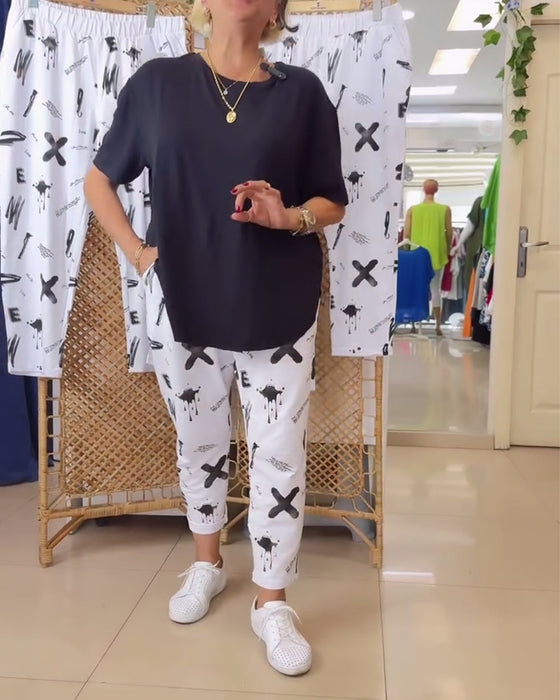 Spodnie z średnim stanem, swobodne, z nadrukiem