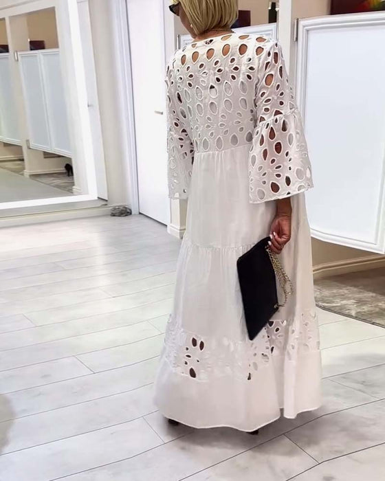 Sukienka elegancka jednokolorowa koronkowa z dziurką