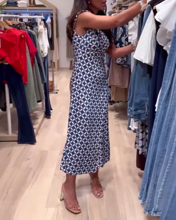 Elegancka sukienka bez rękawów z geometrycznym nadrukiem i okrągłym dekoltem