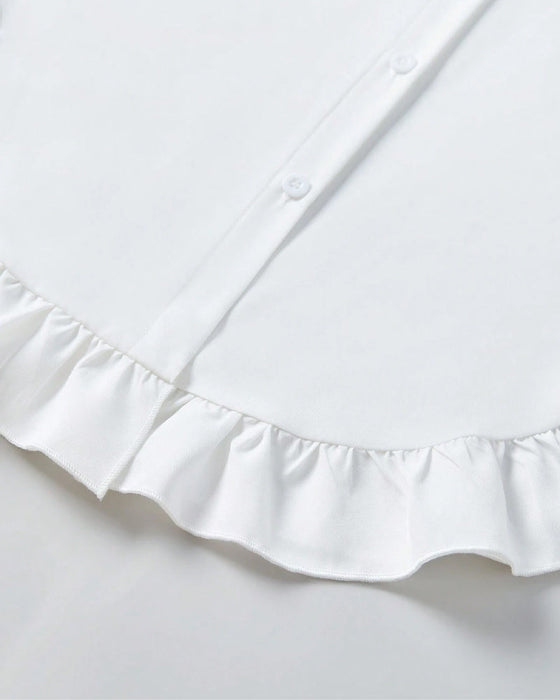 Koszula w jednolitym kolorze z falbaną i guzikami