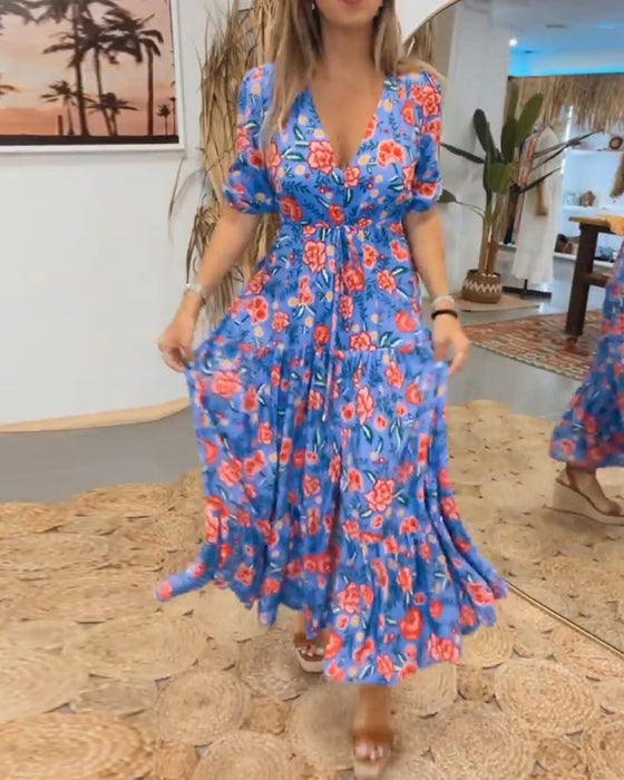 Sukienka z nadrukiem w róże i rozcięciami