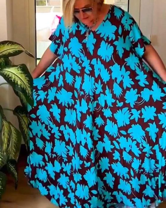 Luźna sukienka z kwiatowym nadrukiem i dekoltem w kształcie litery V