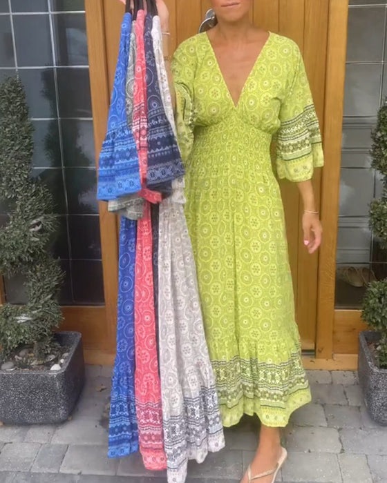 Długa sukienka z długim rękawem w kształcie litery V