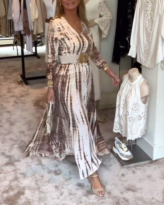 Sukienka z rozcięciem w talii długim rękawem i dekoltem w kształcie litery V