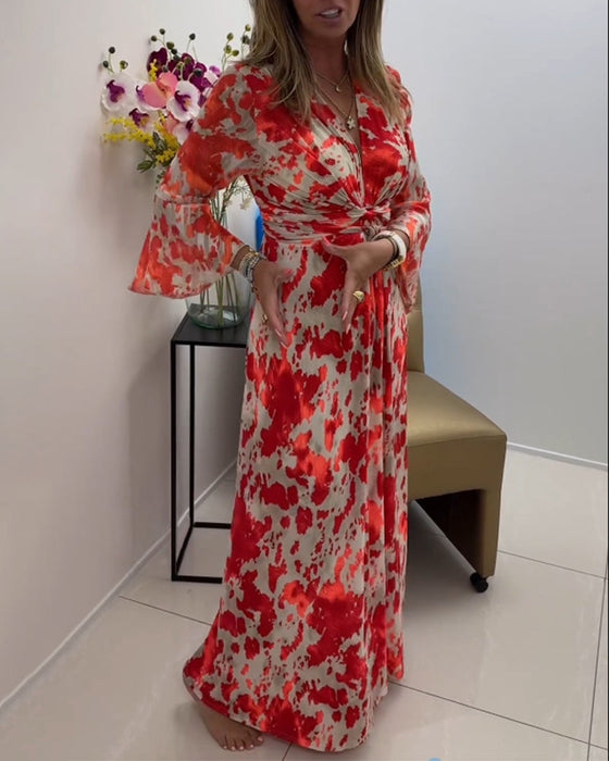 Modna dzianinowa sukienka z głębokim dekoltem w kształcie litery V i nadrukiem