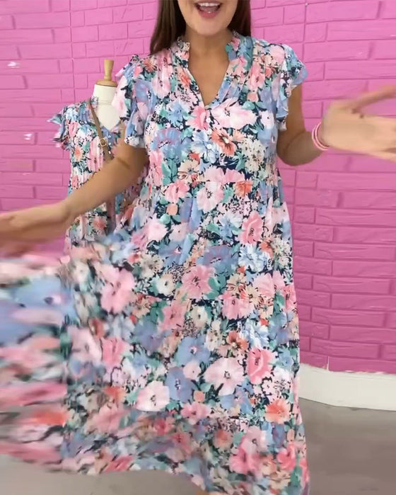 Sukienka z krótkim rękawem i dekoltem w kształcie litery V w kwiatowy wzór