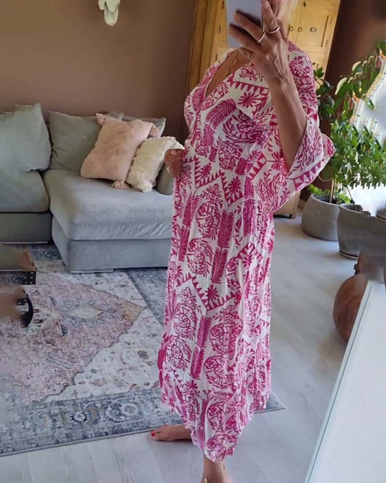 Elegancka sukienka z nadrukiem w kształcie litery V i rękawami typu dzwonek