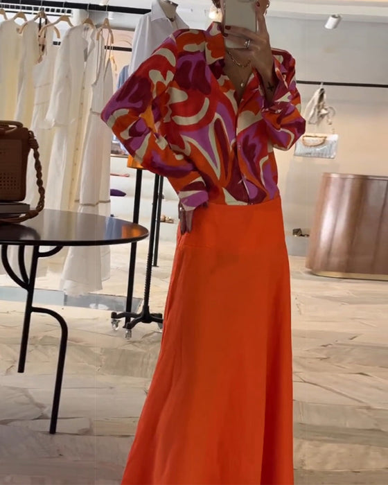 Kolorowa bluzka z klapą i guzikami