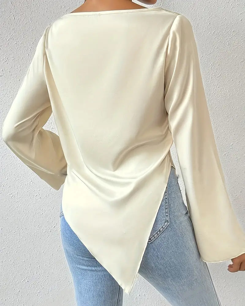 Swobodna jednokolorowa plisowana bluzka z długim rękawem