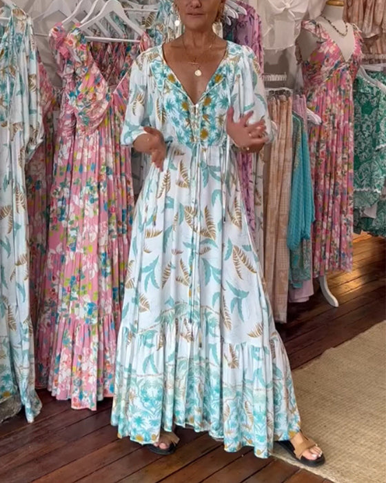 Damska sukienka maxi z dekoltem w kształcie litery V i nadrukiem w liście