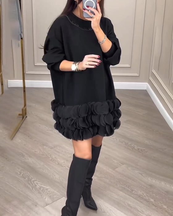 Elegancka sukienka w patchworkowe wstawki