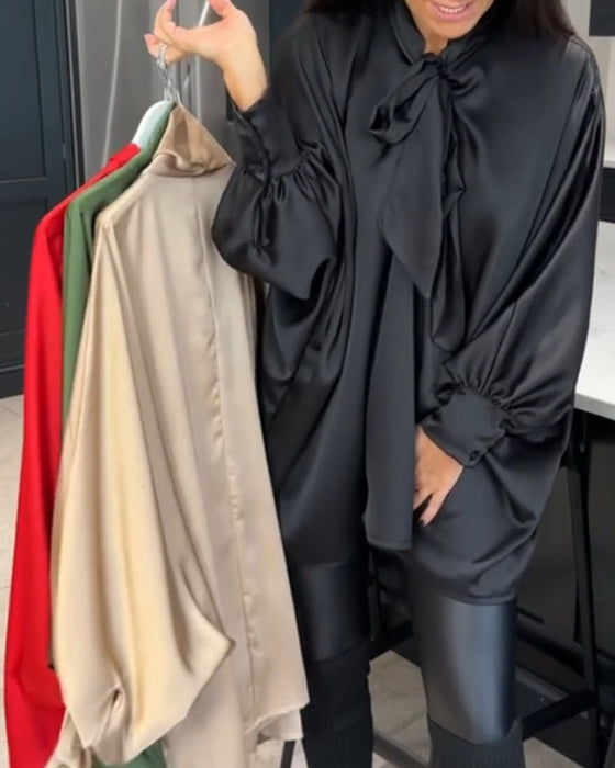 Bluzka w jednolitym kolorze z kokardą