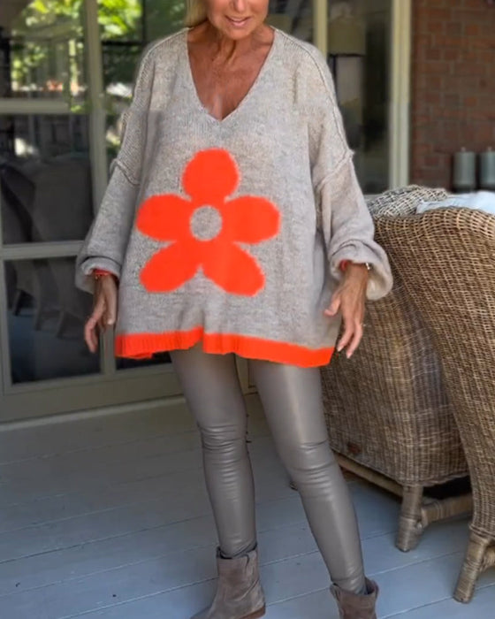 Sweter z dekoltem w kształcie litery V w kwiatowy wzór
