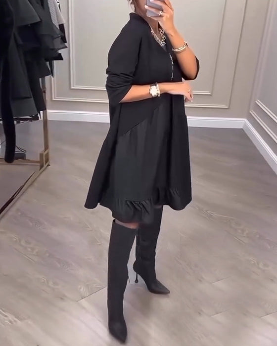 Sukienka o artystycznym charakterze i dekoltem w kształcie litery V