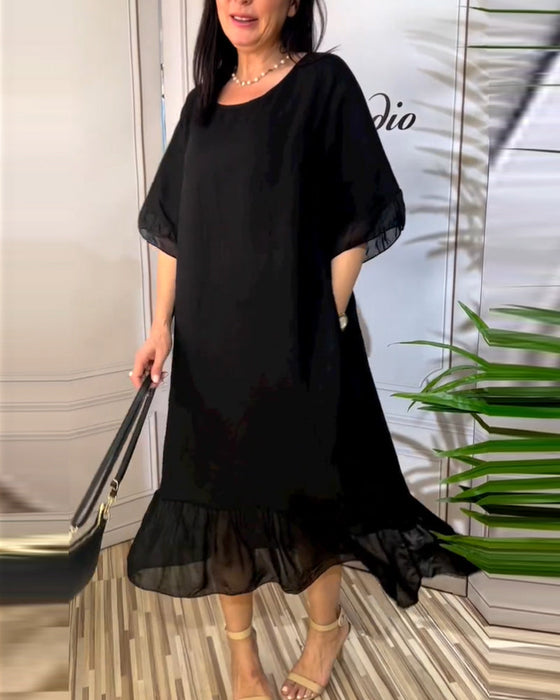 Zwiewna sukienka z wstawkami i krótkimi rękawami