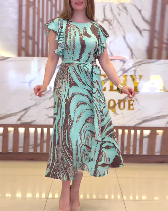 Elegancka sukienka z kontrastowym nadrukiem