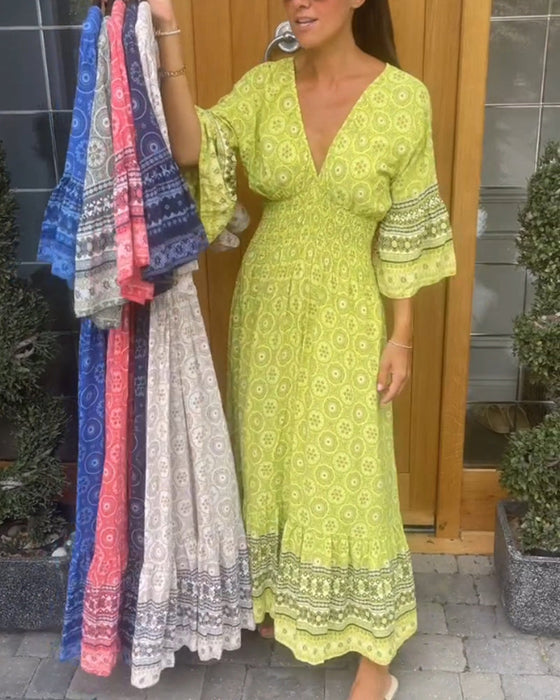 Długa sukienka z długim rękawem w kształcie litery V